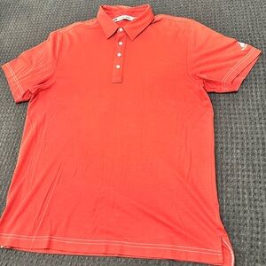 Travis Mathew red polo shirt